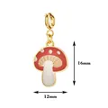 Detail shot of the red mushroom enamel pendant showing dimensions of 16mm by 12mm - Mushroom with Spring Clasp / 16mm x 12mm