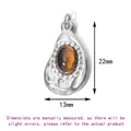 Sleek titanium steel oval pendant featuring a brown natural stone with 22mm x 13mm dimensions - Papaya Steel Rings / Original Color