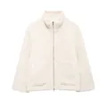 Gedetailleerde weergave van een crème oversized teddy fleecejack met ritssluiting. - S / Tops / Wit