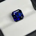 Lab-grown royal blue sapphire emerald cut loose gemstone displayed in white jewelry box - Asscher Cut / 6*6mm Approx 1.15ct / Royal Blue