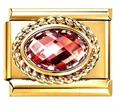 Charm italiano in acciaio dorato con una grande pietra preziosa rossa ovale sfaccettata - zircone rosso