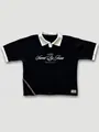 Detail van zwart gebreid poloshirt met witte Saved By Jesus letteropdruk print - S / Tops / Zwart