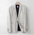 Detailed view of a men's beige linen casual blazer with notch lapels and patch pockets - S / Tops / Apricot