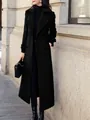 Elegant long black wool coat for women featuring a slim fit double-breasted design and lapels - S / Tops / Black
