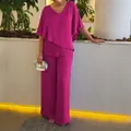Elegante conjunto fucsia de dos piezas con top de pico irregular y pantalones de pata ancha - Rosa rojo