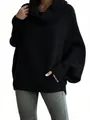 Detailed view of women's black high-neck knit sweater featuring loose lantern sleeves - Black