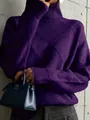 Detailed view of soft purple turtleneck knit sweater with distinctive rhombic pattern design - Deep purple