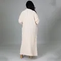 Elegante lange crèmekleurige kabelgebreide vest met zakken en lange mouwen, achterzijde - S / Tops / Abrikoos