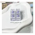 Macro view of four purple linear switches mounted in a clear acrylic fidget toy housing - Violet (Linear Switch Clicky)