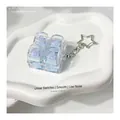Détail d'un jouet anti-stress à 4 touches mécaniques avec porte-clés en forme d'étoile - Bleu Brume Claire (Commutateur Linéaire Clic)