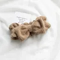 Fascia per capelli con fiocco in peluche marrone per skincare e trucco. - Stile Fiocco Grande / Cachi