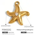 Colgante de estrella de mar de acero dorado con cristal para fabricación de joyas. - Estilo Estrella de Mar con Pedrería (PJ94022G) / 14.2x13.3mm / Dorado