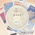 Détail d'un jouet antistress en silicone en forme de chat dans un bol blanc esthétique. - Chat calicot / Chat Calico - Bleu