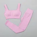 Tweeledige roze geribbelde sneldrogende yogaset met sportbeha en legging voor dames - S / Boven- En Onderstuk / Paars