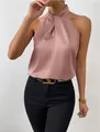 Elegante top all'americana in raso rosa antico con un raffinato dettaglio intrecciato frontale. - Colore loto
