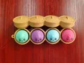 Set of four colorful cute facial expression bun stress relief toys in steamer tray keychain - Emoji Style (4 Buttons) / Without Lights / Multicolor