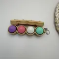 Colorful handheld baozi steamed bun fidget squeeze toy keychain for stress relief - Steamed Bun Style (4 Buttons) / Without Lights / Multicolor