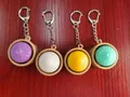 Set of four colorful mini steamed bun toy keychains in steamer baskets for stress relief - Steamed Bun Style (1 Button) / Without Lights / Multicolor