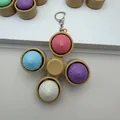 Colorful steamed bun fidget spinner keychain with four soft pressable silicone buttons - Steamed Bun 4-Key Gyro / Without Lights / Multicolor