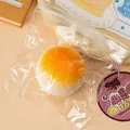 Zacht mochi squishy speeltje met oranje kern in zakje voor ontspanning - Mango mochi