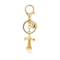 Close-up of polished gold letter T keychain with small heart charm and lobster clasp - Letter T