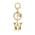 Close-up detail of a golden bubble letter W keychain with heart charm and lobster clasp - Letter W