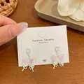 Elegant butterfly stud earrings with colorful gradient wings and clear gemstones - Rainbow Butterfly Style (NV4)