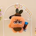 Primer plano de un llavero de peluche de caqui gruñón con pelo naranja muy suave. - Estilo Caqui / 10cm