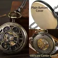 Vintage bronzen mechanisch zakhorloge met holle gravure en zichtbare versnellingen - Bloemblad Gegraveerd Mechanisch / Brons