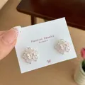 Pink cherry blossom stud earrings with delicate silver-tone petals on card - Cherry Blossom Pink Crystal (HHW008)