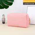 Mittelgroße rosafarbene PU-Leder Kosmetiktasche für Reise und Make-up-Aufbewahrung - M / Wasserrosa