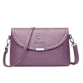 Elegant purple faux leather crossbody bag for women featuring a stylish metal kangaroo logo - Purple