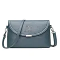 High-quality elegant blue faux leather crossbody bag for women with silver kangaroo logo - Blue
