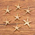 Goldene Seestern-Anhänger aus Legierung als Schmuckverbinder für DIY-Zubehör - Seestern-Verbinder-Form (Nr. 29) / 14x18mm