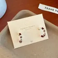 Elegant silver-tone enamel hoop earrings with dark brown striped pattern design - Red Bamboo Style C-Hoop (DYQ)