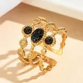Vintage 18K vergulde roestvrijstalen ring met drie zwarte immitatie turkooizen - Goud-Zwarte Steen