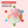 Pink plush squeaky dog flying disc toy with colorful webbing tabs for interactive play - 12cm Squeaky Toy / Small Pink Flying Disc