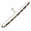Handgefertigtes Boho-Tila-Perlenarmband mit verstellbarem goldfarbenem Kordelzug - Schwarz Gold Graublau Marmor Gewebt
