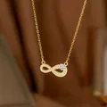 Elegant 18K gold plated infinity pendant necklace featuring micro-paved cubic zirconia - Single Zircon Figure Eight (9247)
