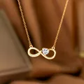 Elegant gold infinity necklace featuring a sparkling heart-shaped cubic zirconia stone - Heart Zircon Figure Eight (9249)