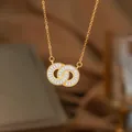 18K gold plated titanium steel necklace with double interlocking circle zircon pendant - Double Loop Circle (9250)