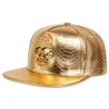 Shiny gold crocodile pattern hip hop snapback cap with a large rhinestone skull emblem - Skull Style / Gold
