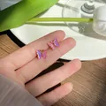 Elegant small pink iridescent laser butterfly stud earrings for women everyday wear - Butterfly Stud Earrings / Iridescent Pink