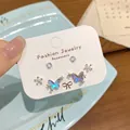 Elegant silver-plated laser butterfly and flower stud earring set with zircons for women - Butterfly Crystal Cluster Set / Iridescent Blue