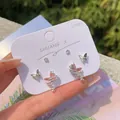 Elegant pink laser butterfly earring set featuring 925 silver needles and star details - Surrounding Butterfly Set / Iridescent Pink