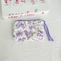 Small floral print canvas pouch with purple zipper and May Rabbit brand label - Purple Flower Green Leaf