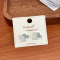 Dreamy blue gradient floral stud earrings with pearls and sparkling crystal accents - Ice Blue Three-Petal Flower (HDT24)