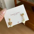 Asymmetric brown bear and heart stud earrings with pearls and bows in golden finish - Cute Bear Style (VF19) / Brown
