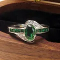 Luxury silver rotatable ring featuring a central oval green zirconia and pavé stones - 7 / Green Flower Style (J552) / Green