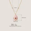 Rosa Emaille-Ei Medaillon-Halskette mit Goldfiligran und Herz, Material Kupfer 17g - Roter Zirkon Ranken Ei Halskette